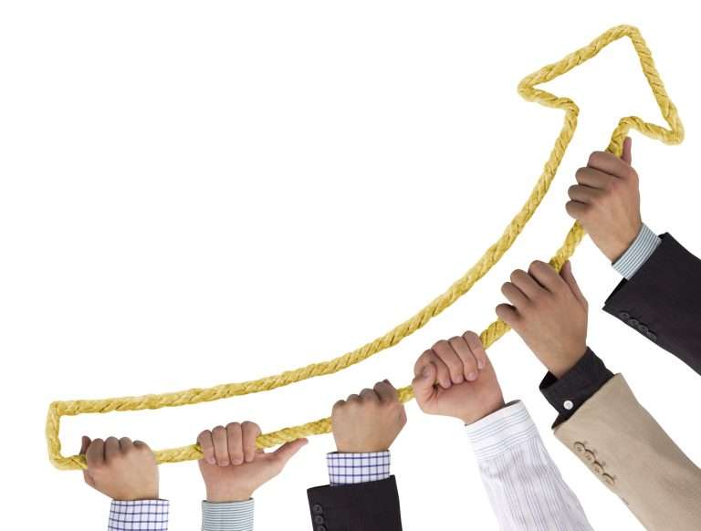 Hands holding yellow rope forming arrow pointing upwards